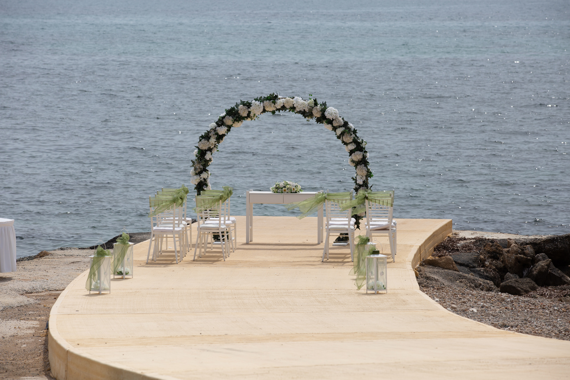 Wedding arch on the Kefalos beach pier, Kefalos Beach Weddings