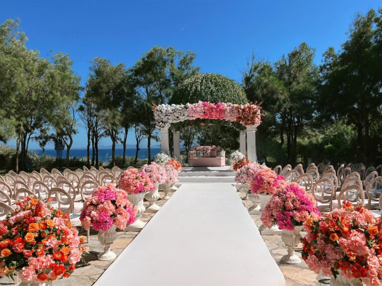 Ceremony aisle with a floral arch in the gardens, Kempinski Hotel Barbaros Bay Bodrum