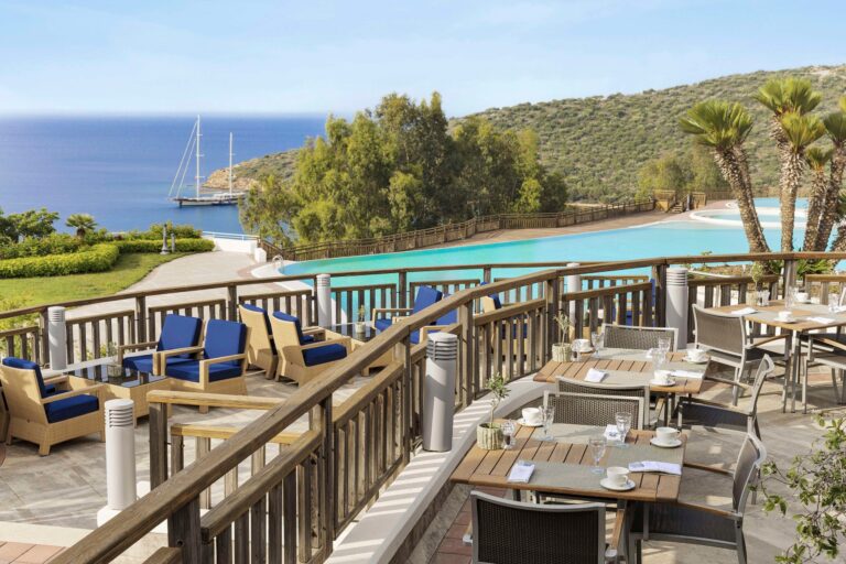 Restaurant terrace beside the pool, Kempinski Hotel Barbaros Bay Bodrum