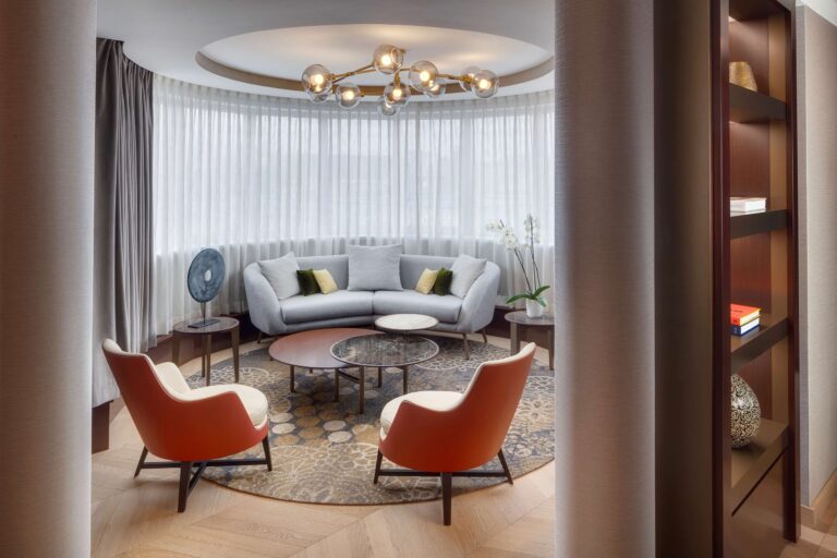 Suite living area with curved windows, Kempinski Hotel Corvinus Budapest