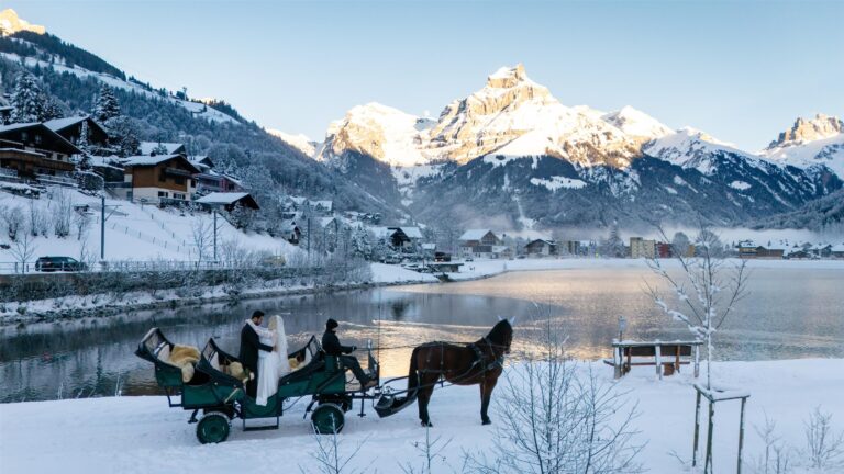 A horse-drawn sleigh by the lake in winter, Kempinski Palace Engelberg