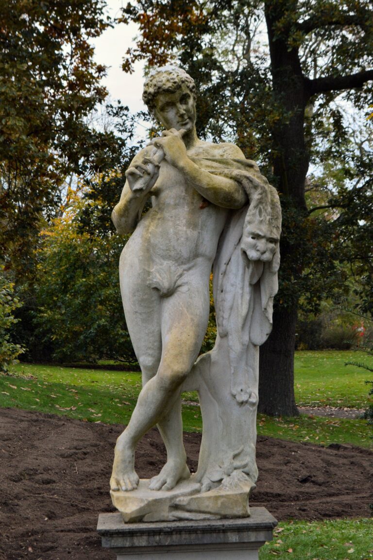 A marble figure among the trees in the palace garden, Kew Palace