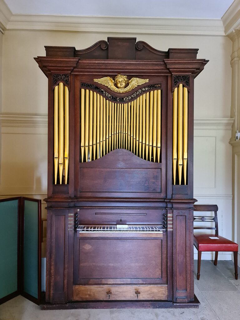 The Georgian chamber organ standing in a State Room, Kew Palace