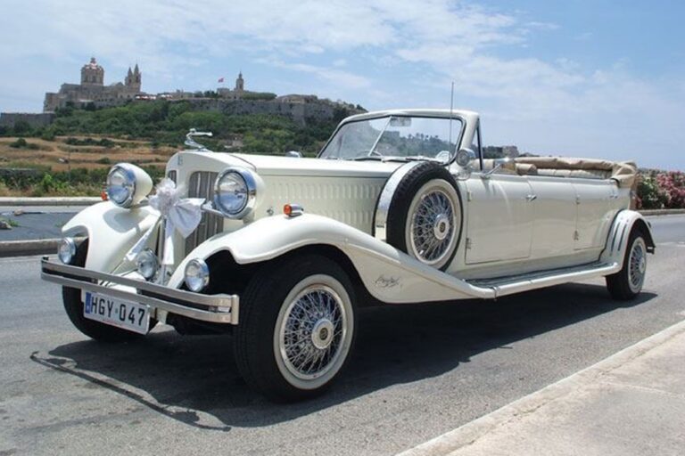 Vintage open-top bridal car with a view towards Mdina, KG Events Malta