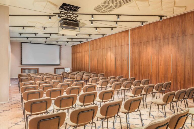 Event room set theatre-style with a screen, Kimpton BEM Budapest