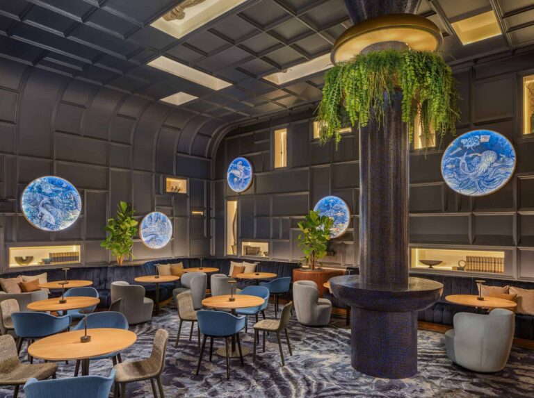Lounge bar with porthole-style windows, Kimpton BEM Budapest