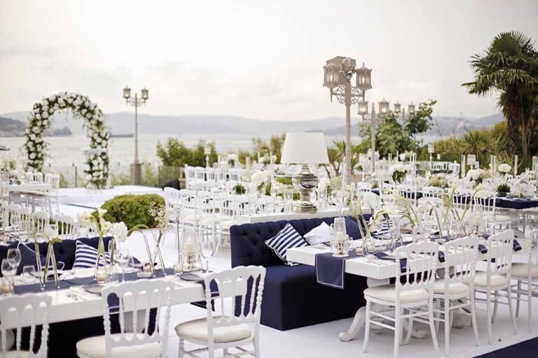 A reception tablescape beside the water, KM Events