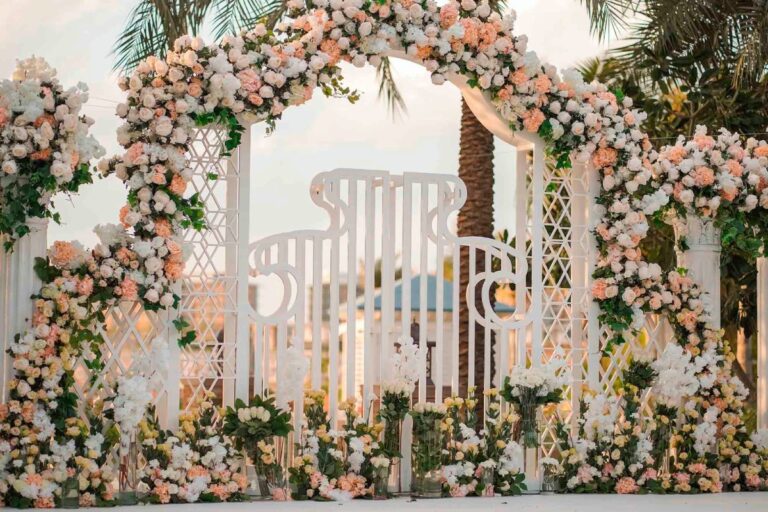 A ceremony arch of roses and drapes, KM Events