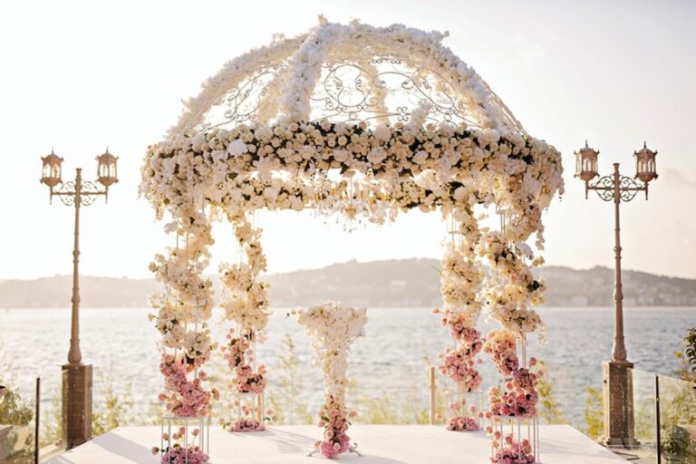 A floral gazebo on a terrace by the sea, KM Events