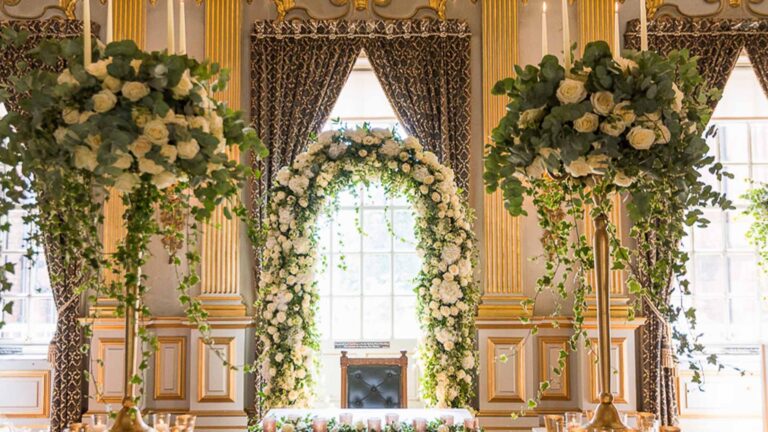 A floral arch set in a window of the Stucco Ballroom, Knowsley Hall