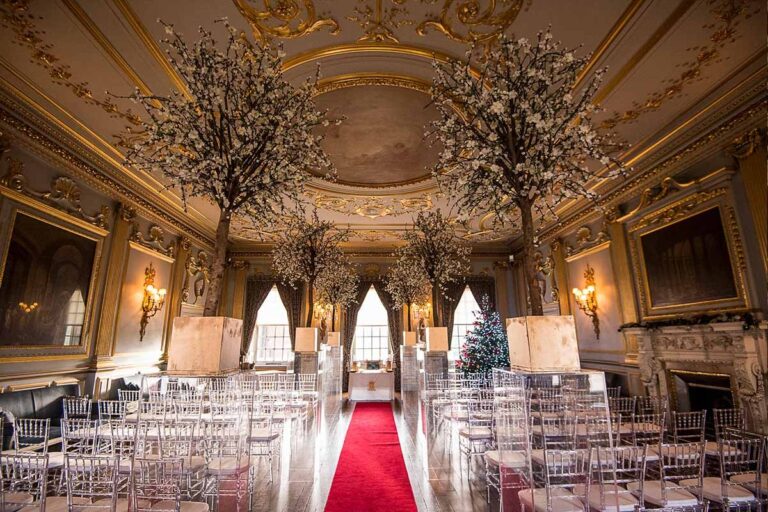 The Stucco Ballroom with a red aisle runner, Knowsley Hall