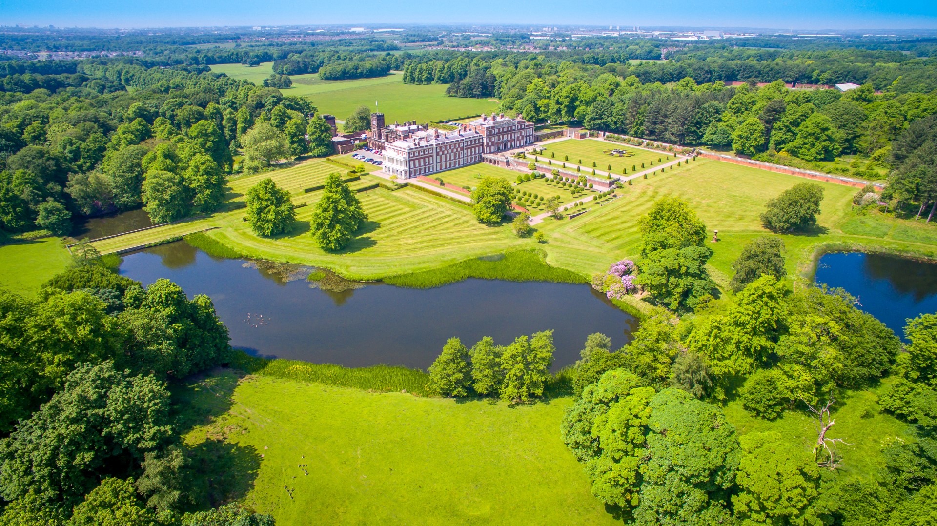 Aerial view of the hall, its gardens and the lake, Knowsley Hall
