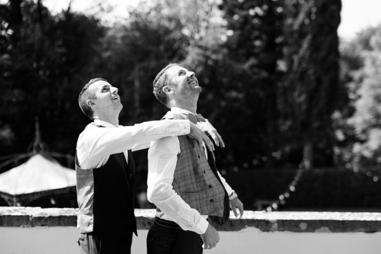 Two of the wedding party sharing a laugh before the ceremony, Tuscany, La Bottega del Sogno