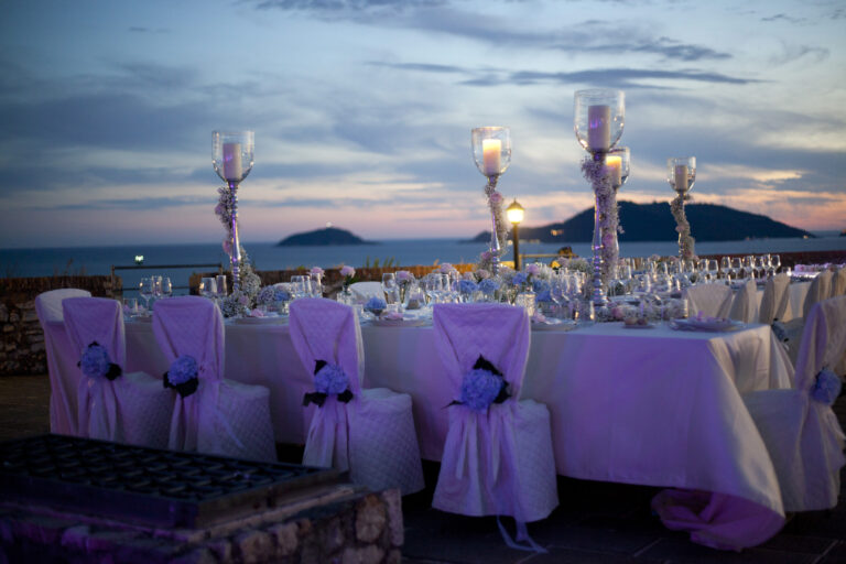 A seaside table laid at dusk, Italian Riviera, La Bottega del Sogno
