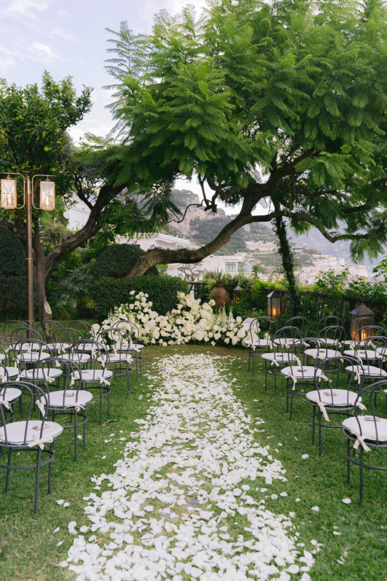 A white petal aisle across the lawn to a ceremony arch of white flowers, Hotel Santa Caterina, Amalfi, La Calla Events