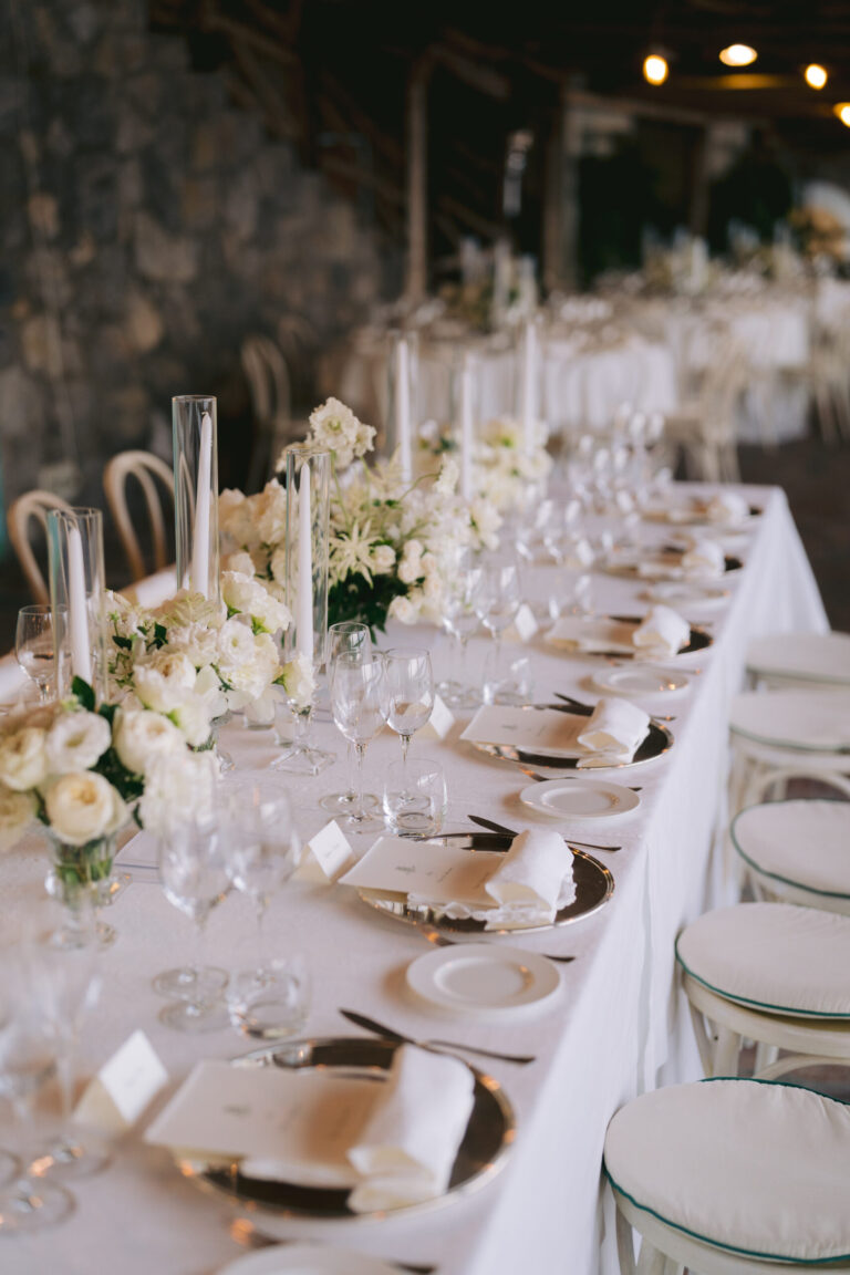 A long table of white flowers and tapers under the pergola, Hotel Santa Caterina, Amalfi, La Calla Events