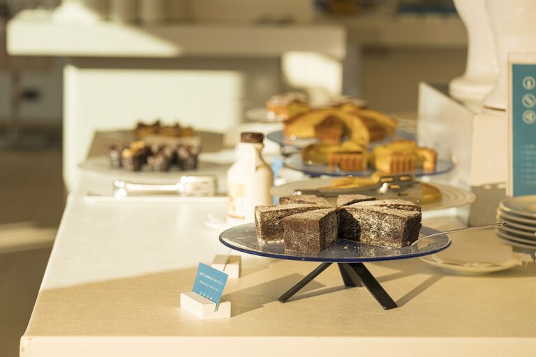 The breakfast buffet, cakes and pastries in the morning light, La Plage Resort