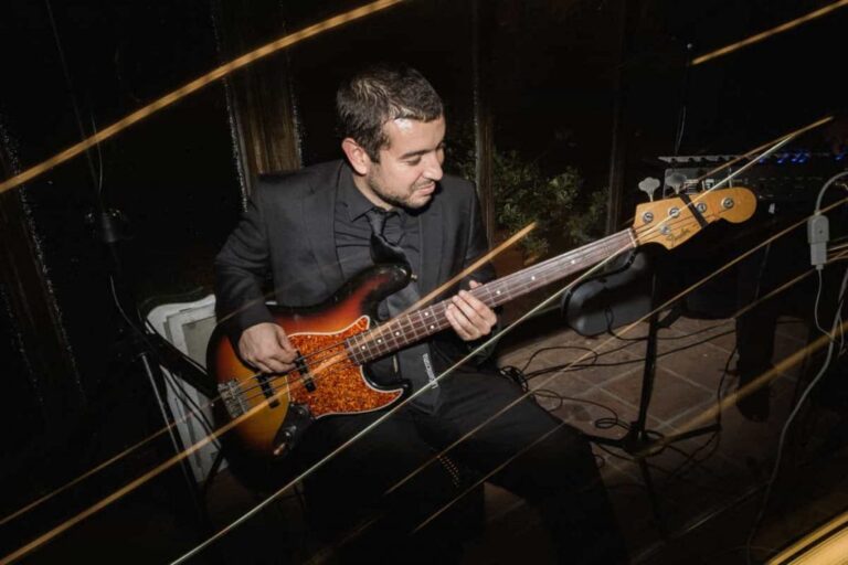 Bass guitarist performing at a wedding celebration, La Semicroma