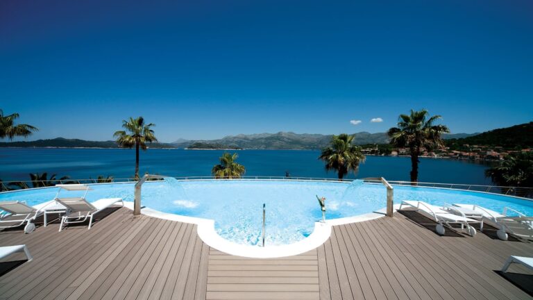 The infinity pool by day, its edge dissolving into the blue of the Adriatic and the far islands, Lafodia Sea Resort
