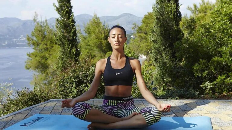 Yoga on a terrace high above the sea, the Adriatic and the islands stretching to the horizon, Lafodia Sea Resort