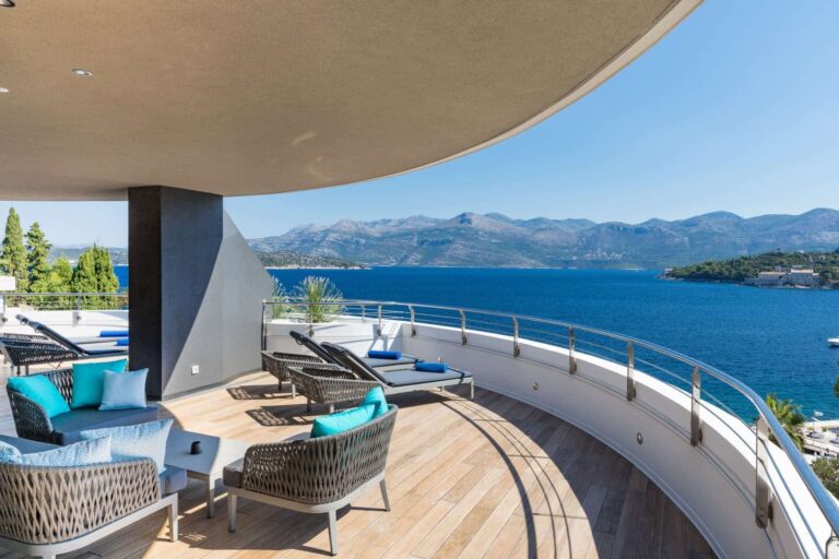 A suite terrace with loungers and armchairs, open to the sea and the mountains of the mainland, Lafodia Sea Resort