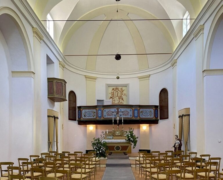 The church with floral arch for a ceremony, Le Torri di Bagnara Castles