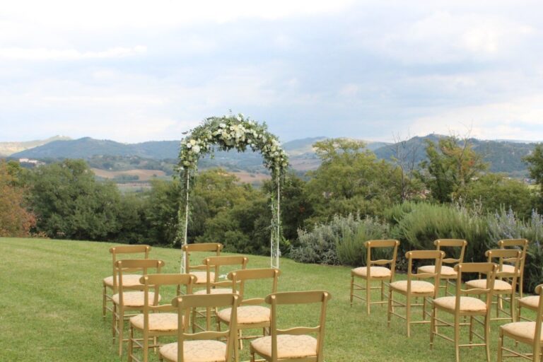 A floral arch ceremony at Le Torri di Bagnara, Le Torri di Bagnara Castles