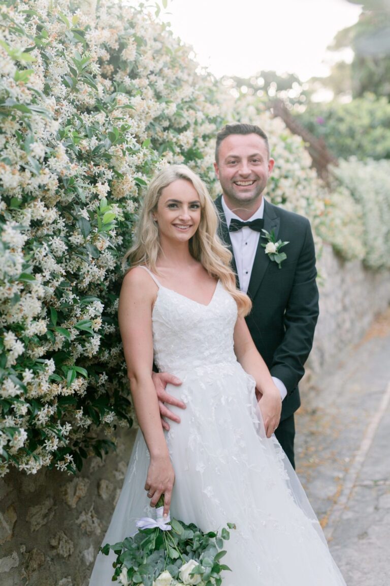 The couple against a wall of jasmine in flower, Capri, Leo Eventi