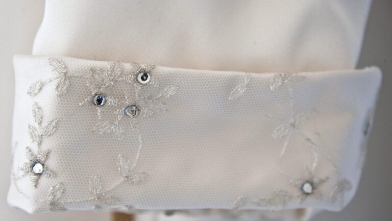 Beaded and embroidered cuff on a bridal gown, Lesley Cutler Bridal Wear