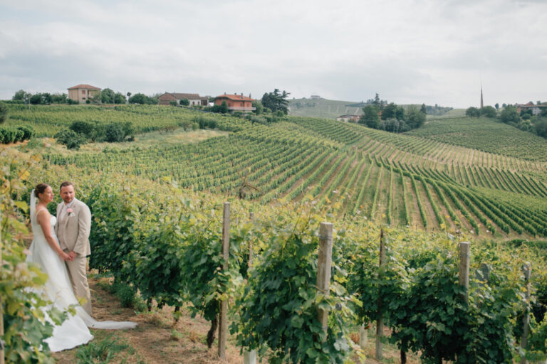 Couple among the vine rows of a Piedmont vineyard, Letizia T. Events