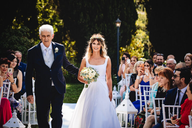 Flavia walks down the aisle with her father at Villa Pocci, Light & Dreams