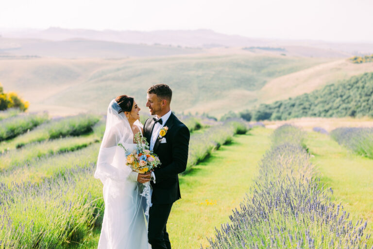 Nikita and Jason between the rows of lavender at Country Relais Le Capanne, Volterra, Tuscany, Light & Dreams