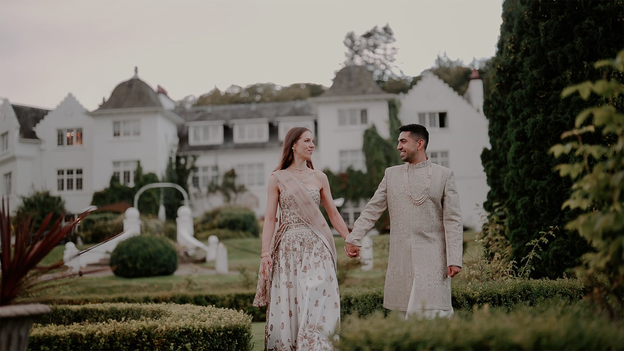 Hannah and Bunty walk through a formal garden in the Scottish Highlands (film still), Lights and Magic
