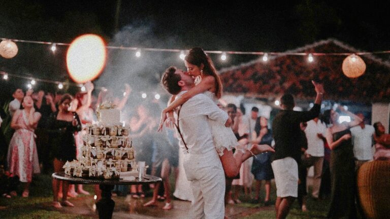 Shenny and Roam dancing beside the cake under festoon lights, Villa Bentota (film still), Lights and Magic