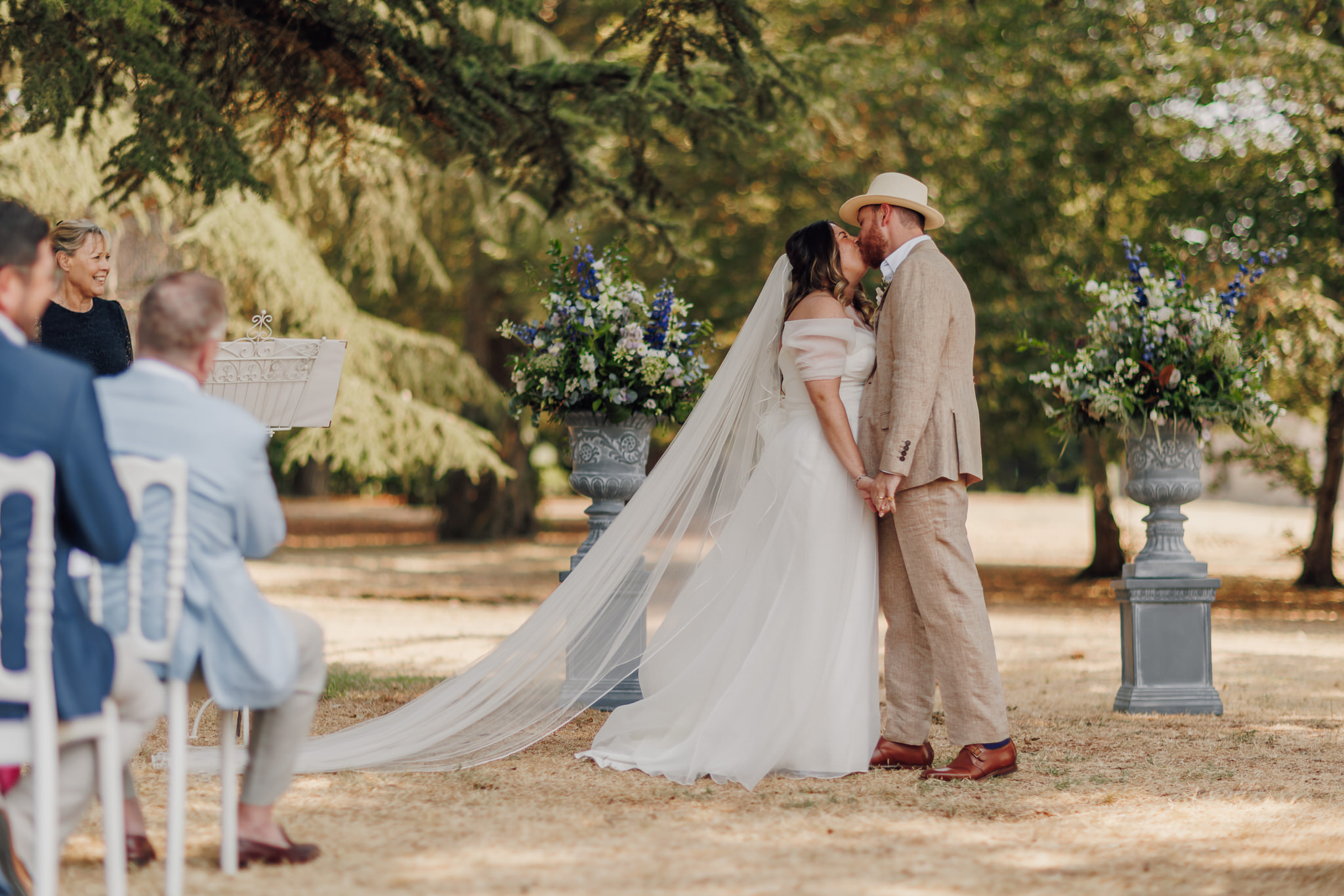 The couple at their ceremony in the shade of the cedars, Chateau Naudou, near Toulouse, Lina + Tom Photography