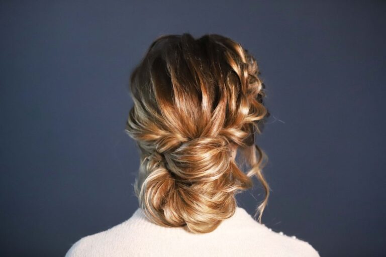 A low braided bridal chignon, seen from behind, Lisa Semenzato