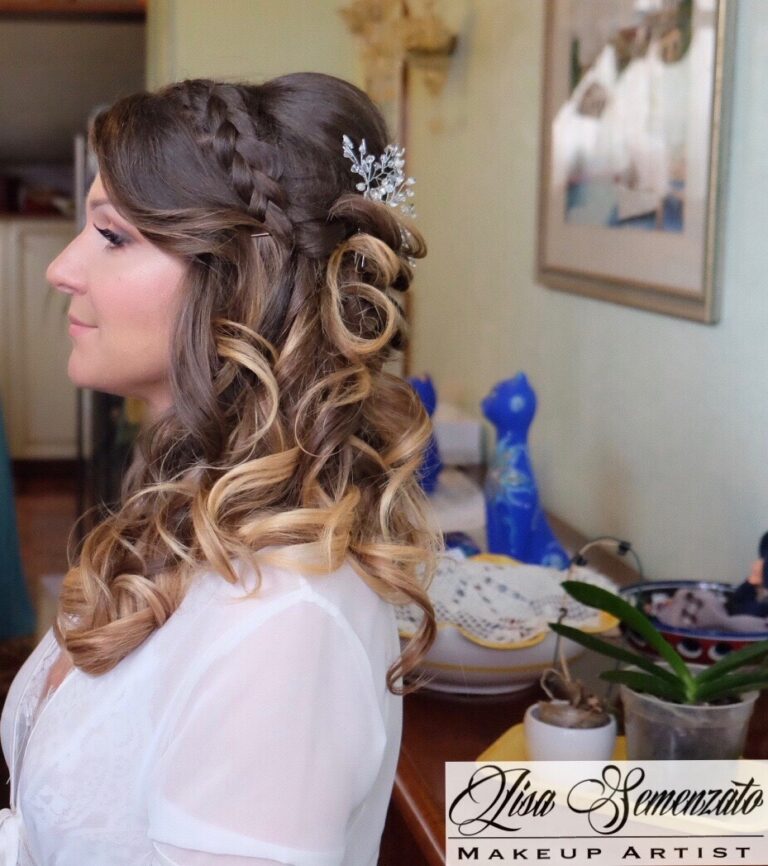 A half-up braided style with soft curls, in profile, Lisa Semenzato