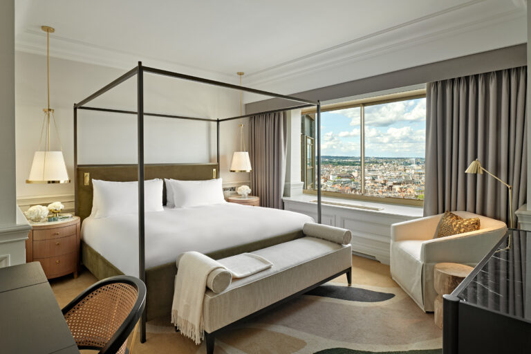 A suite bedroom with a four poster bed, London Hilton on Park Lane