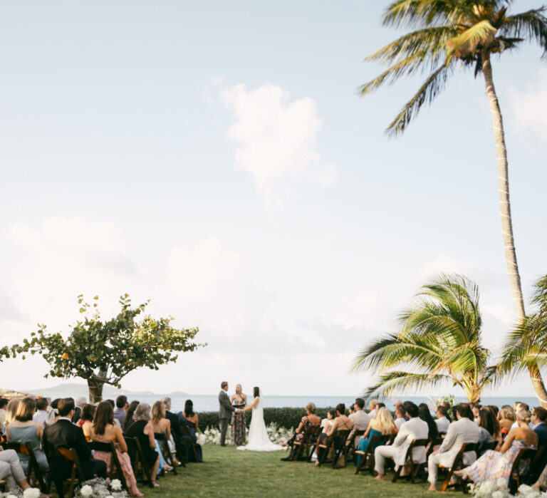 Ceremony on the lawn overlooking the sea, Long Bay Beach Resort