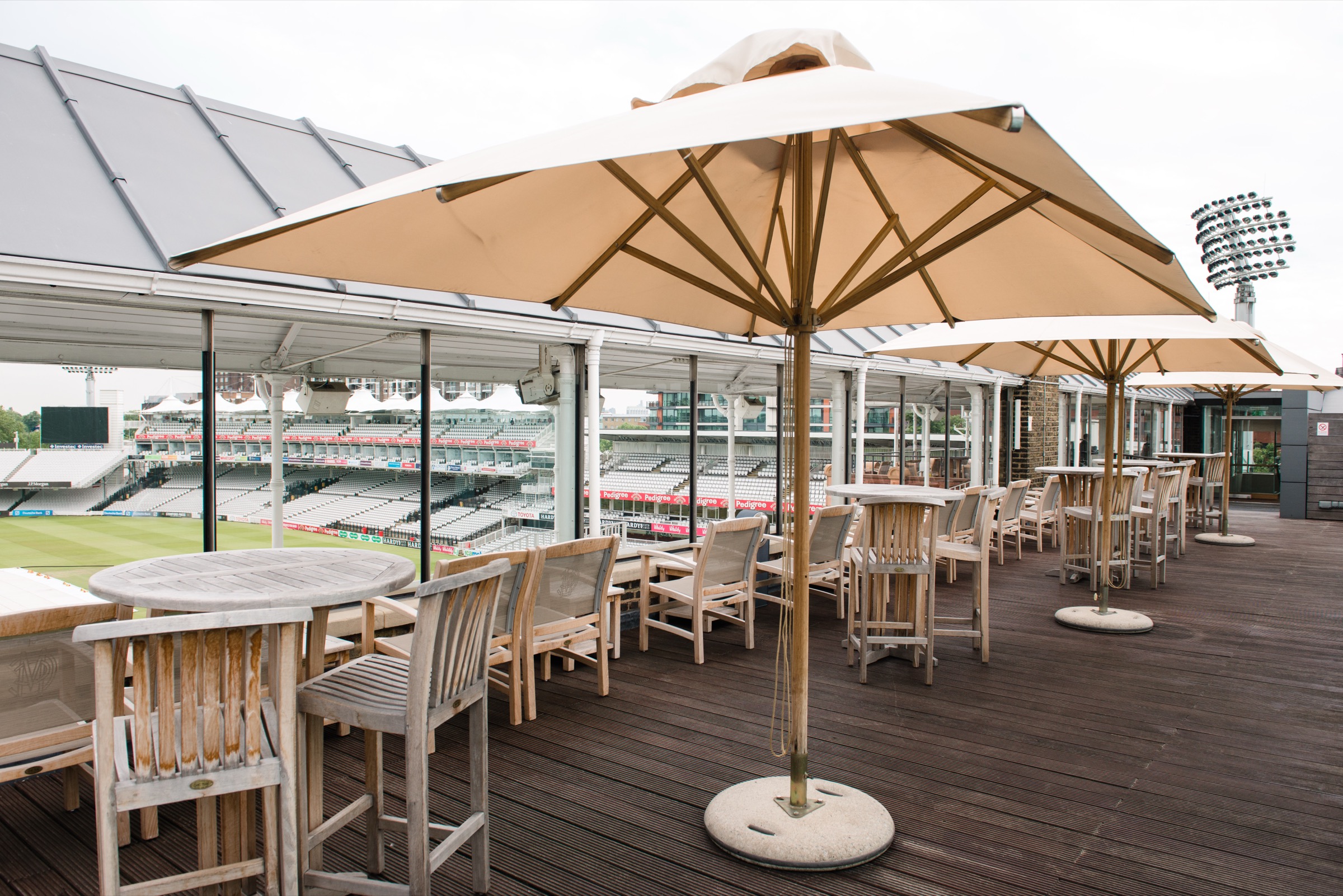 The Pavilion Roof Terrace above the ground, with the floodlights beyond, Lord’s Cricket Ground