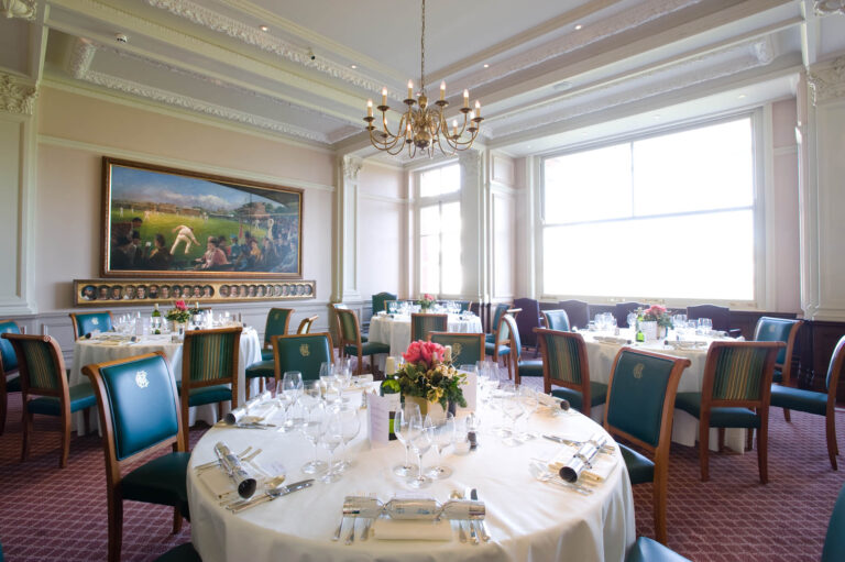 A round table in the Writing Room beneath a cricketing painting, Lord’s Cricket Ground