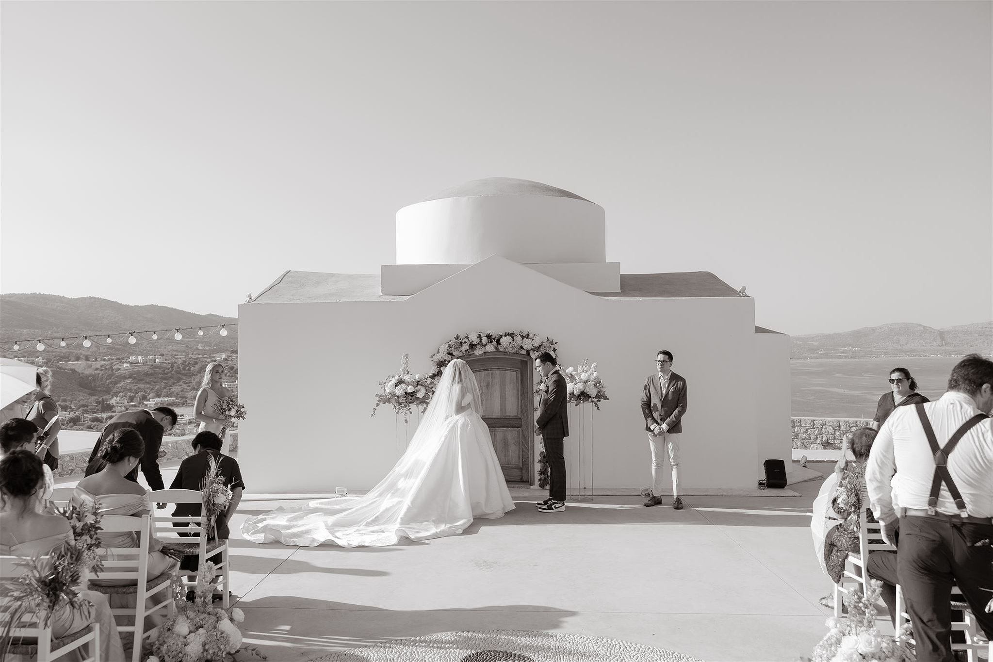 A wide view of the ceremony, chapel and sea beyond, Lorella Giannini