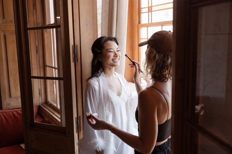 Lorella at work on a bride's makeup, window light, Lorella Giannini