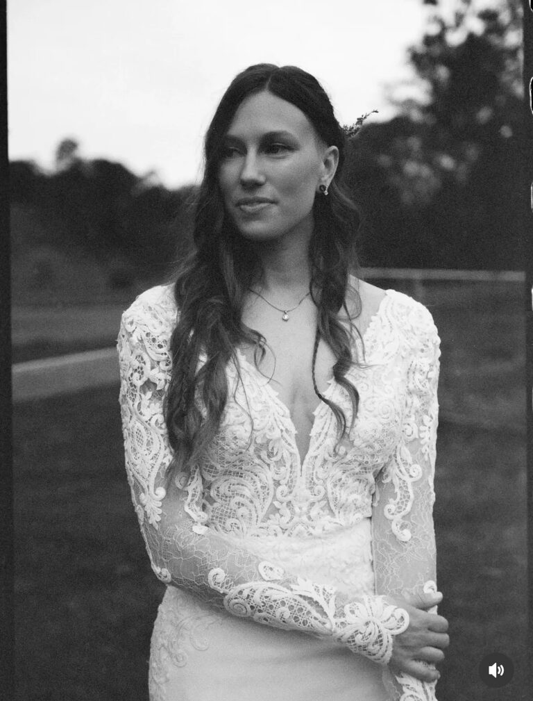 A bride's portrait in a lace long-sleeve gown. Photograph: James Bennett, Lorella Giannini