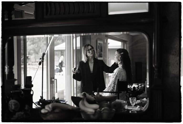 Lorella at work, caught in a mirror's reflection, Lorella Giannini