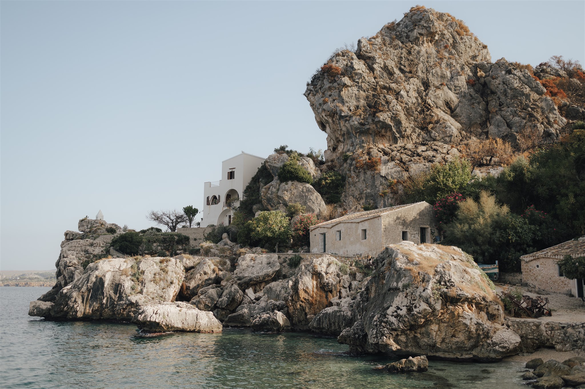 The tonnara buildings and limestone rocks at Scopello, the setting for Lisa and Yashar's wedding, LOVIÙ Events