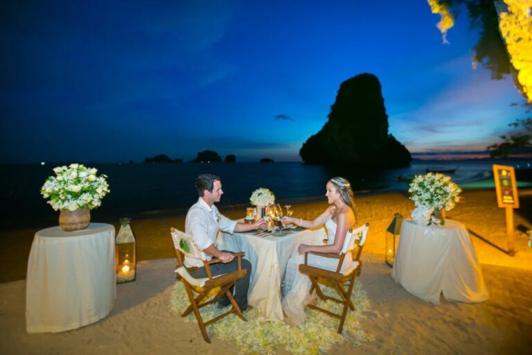 A candlelit table for two on the sand at dusk, Railay, Krabi, Lucida Image