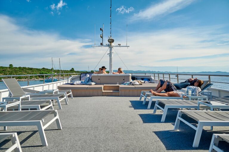 The sundeck with shaded area and loungers, Lupus Mare