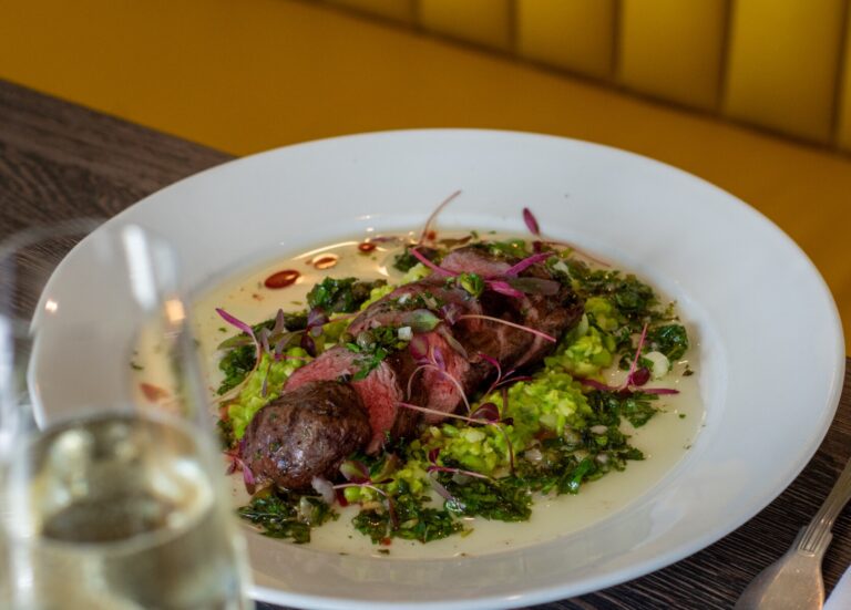 A plated main course of venison with garden greens, two-rosette cooking, Lythe Hill Hotel & Spa