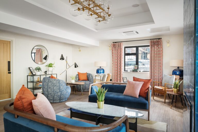 A garden suite sitting area with sofas, a coffee table and views to the grounds, Lythe Hill Hotel & Spa